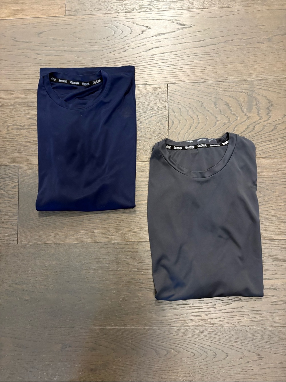 Reebok men’s athletic tops sz MED & LG ret $89each